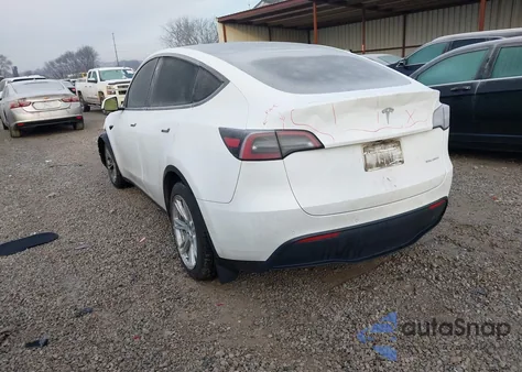 2022 Tesla Model Y Long Range Dual Motor All-Wheel Drive z USA, uszkodzony, nr VIN 7SAYGDEE2NF438122